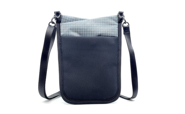 The rear of the P.I.K.A. Pouch in Northwest Sky (light grey with white gridding) 200 Halcyon.